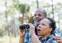 Older couple birdwatching