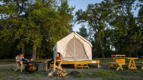 Campers enjoy a Tentrr campsite at Louisville State Recreation Area