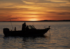 Anglers fishing from a boat at Lake MacConaughy