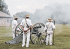 Reenactors firing a cannon at Fort Atkinson