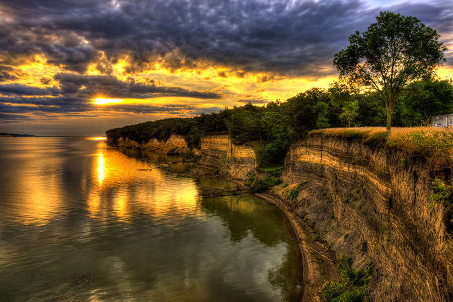 Cliffs lit up by brilliant sunset at Lewis and Clark Lake.