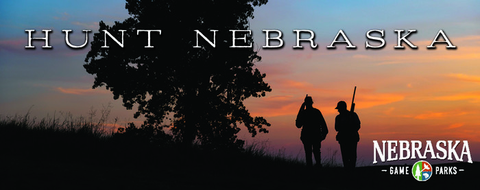 "Hunt Nebraska" text over image of silhouetted hunters at sunset