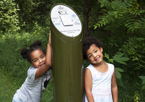 Girls standing by Great Park Pursuit post