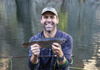 Man holding a trout