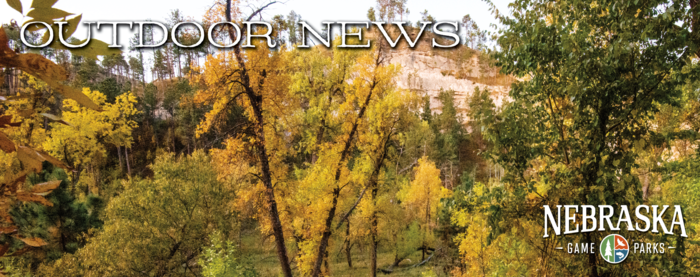 Fall foliage with Game and Parks logo and "Outdoor News"