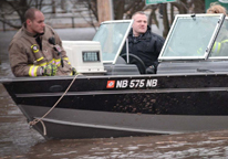 Conservation officers in a boat