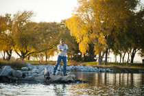 Man fishing at Fort Robinson State Park in fall