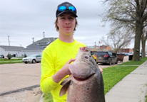 Isaac Howser with state record bigmouth buffalo fish