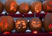 Jack-o'-lanterns in a row