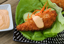 Panko-crusted perch on plate