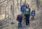 Family hiking at Schramm Park State Recreation Area