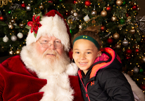 Girl posing with Santa