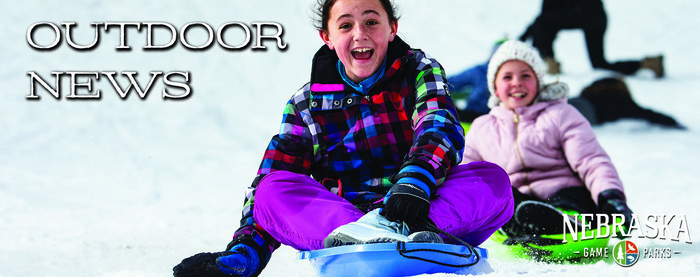 Header with picture of people sledding