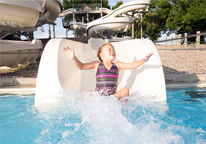 Girl going down the waterslide at Mahoney State Park