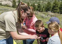 Outdoor educator working with kids