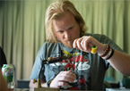 Man tying a fly in a Game and Parks workshop