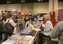 People at a sports show visiting a Game and Parks booth