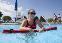 Female lifeguard in pool