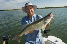 Angler holding up a trophy walleye.