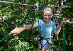 Girl on Go Ape ropes course