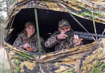 Turkey hunters hunting from a blind