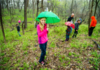 Girl with umbrella in woods at Indian Cave State Park