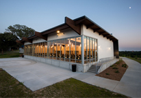 Outside view of Crete Carrier Riverview Lodge at night