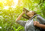 Woman birdwatching with bincoulars