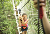 Girl on Go Ape ropes course