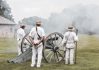 Reenactors shooting a cannon at Fort Atkinson