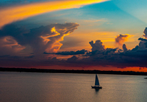 Sailboat on Branched Oak Lake at sunset