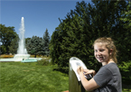 Girl standing at Great Park Pursuit post