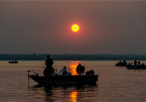 Anglers fishing from boat at sunset at Calamus Reservoir