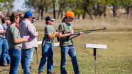 Participants at a youth shooting event