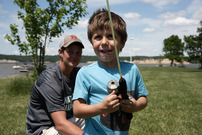 Boy fishing during kids' fishing clinic