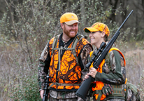 Two deer hunters in the field