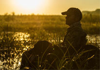 Hunter in the field with his dog