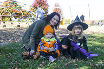 Mother with kids dressed in Halloween costumes at Nebraska state park