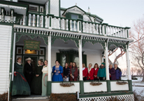 People gathered on the porch of Buffalo Bill's mansion