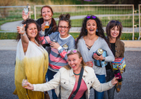 Group of friends holding wine glasses at Sip Nebraska