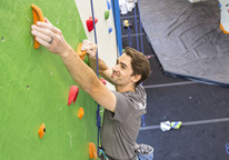 Man on rock climbing wall at Mahoney State Park