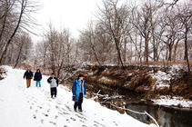 People hiking at Platte River State Park in winter