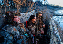 Duck hunters in a blind