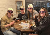 Group of friends at a Nebraska Game and Parks trivia night