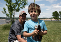 Boy smiling while fishing