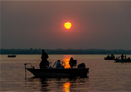 Anglers on a boat at Calamus Reservoir at sunset