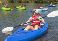 Woman kayaking at the Fort Kearny Outdoor Expo