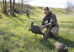 Hunter setting up a turkey decoy