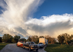 Campers underneath a dramatic cloudy sky at Sherman Reservoir