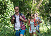 Family hiking on a wooded trail